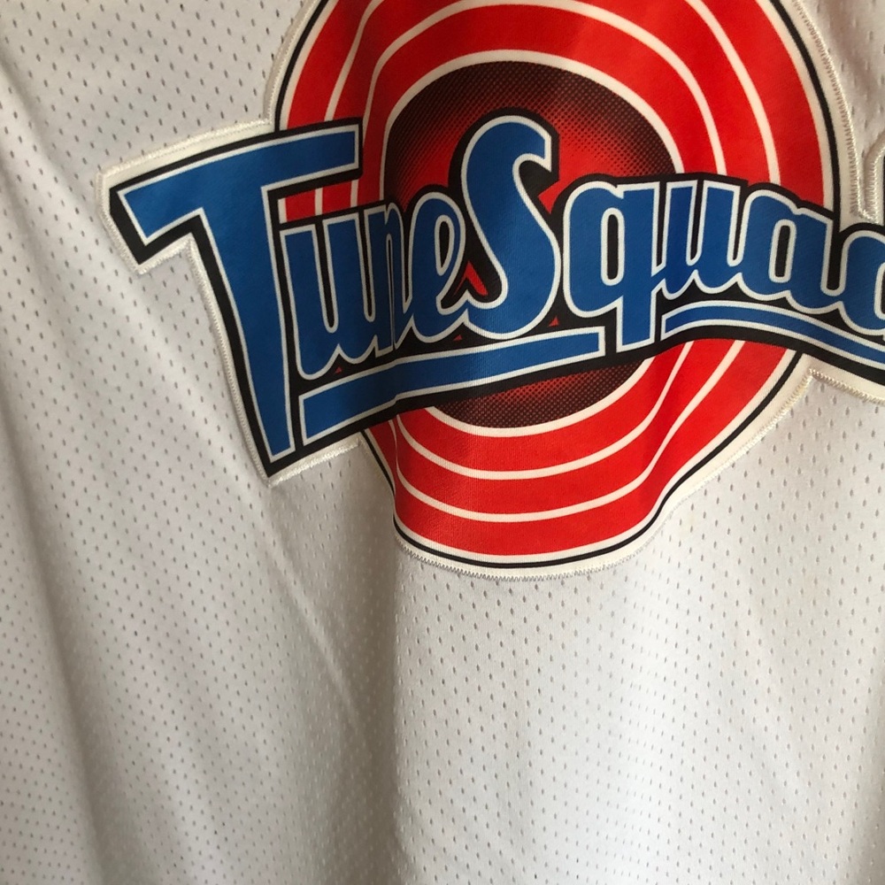 TuneSquad White Basketball Jersey with Red & Blue Logo